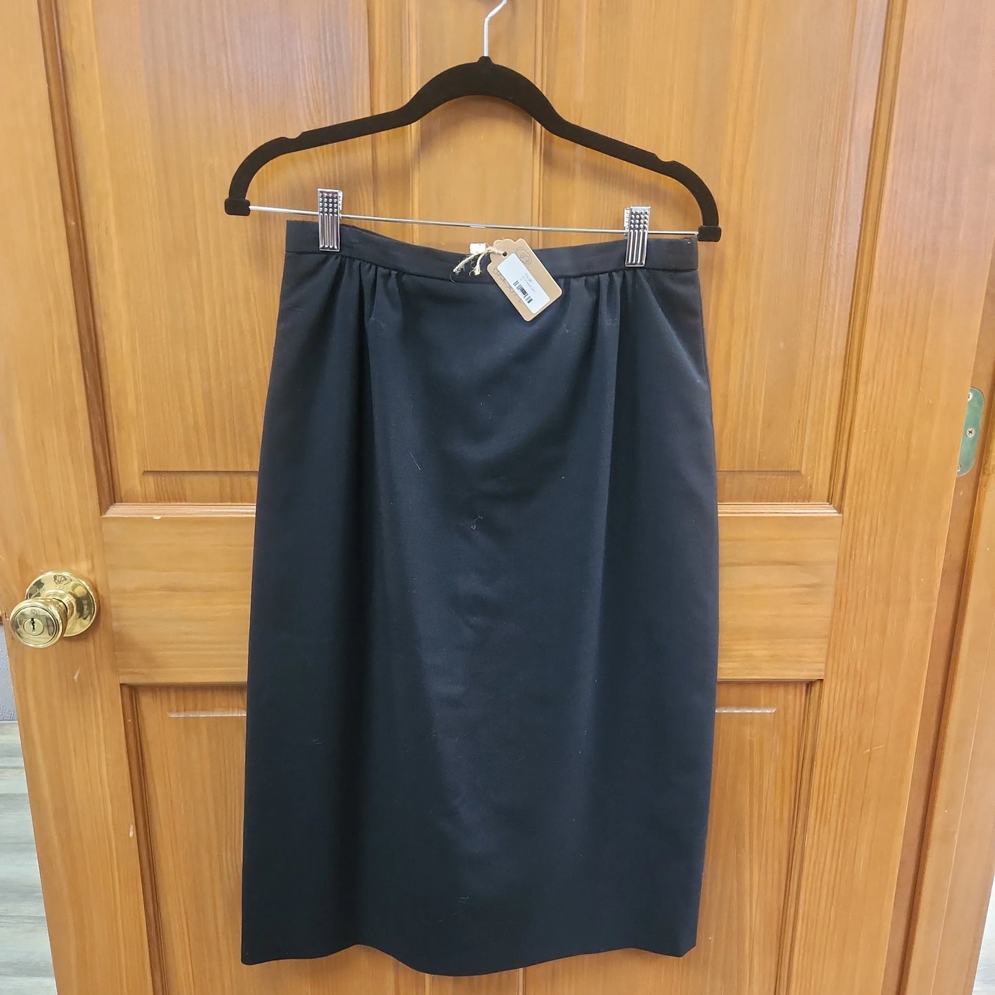 Black knee length Skirt, size 28. RS 22 - Scarlett's Riverside Boutique
