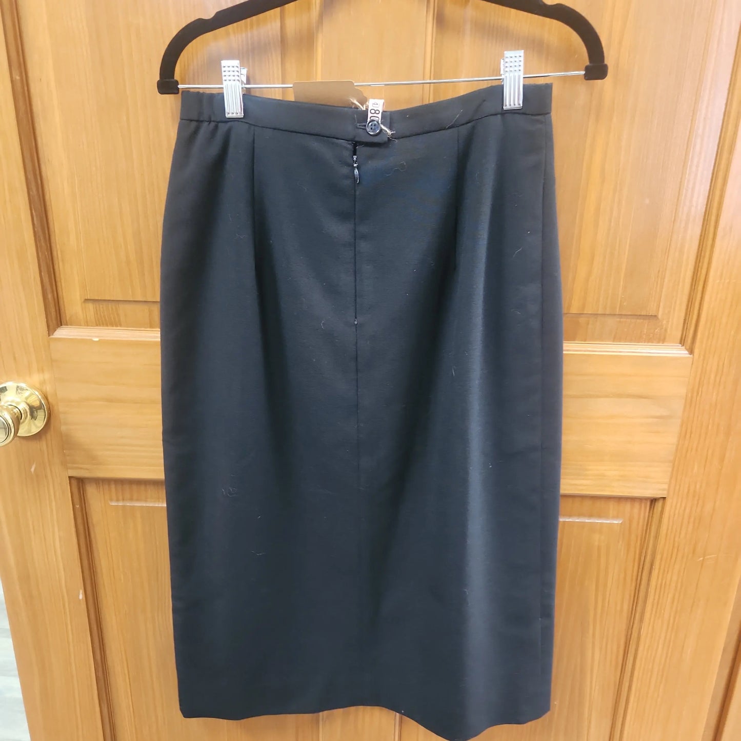 Black knee length Skirt, size 28. RS 22 - Scarlett's Riverside Boutique