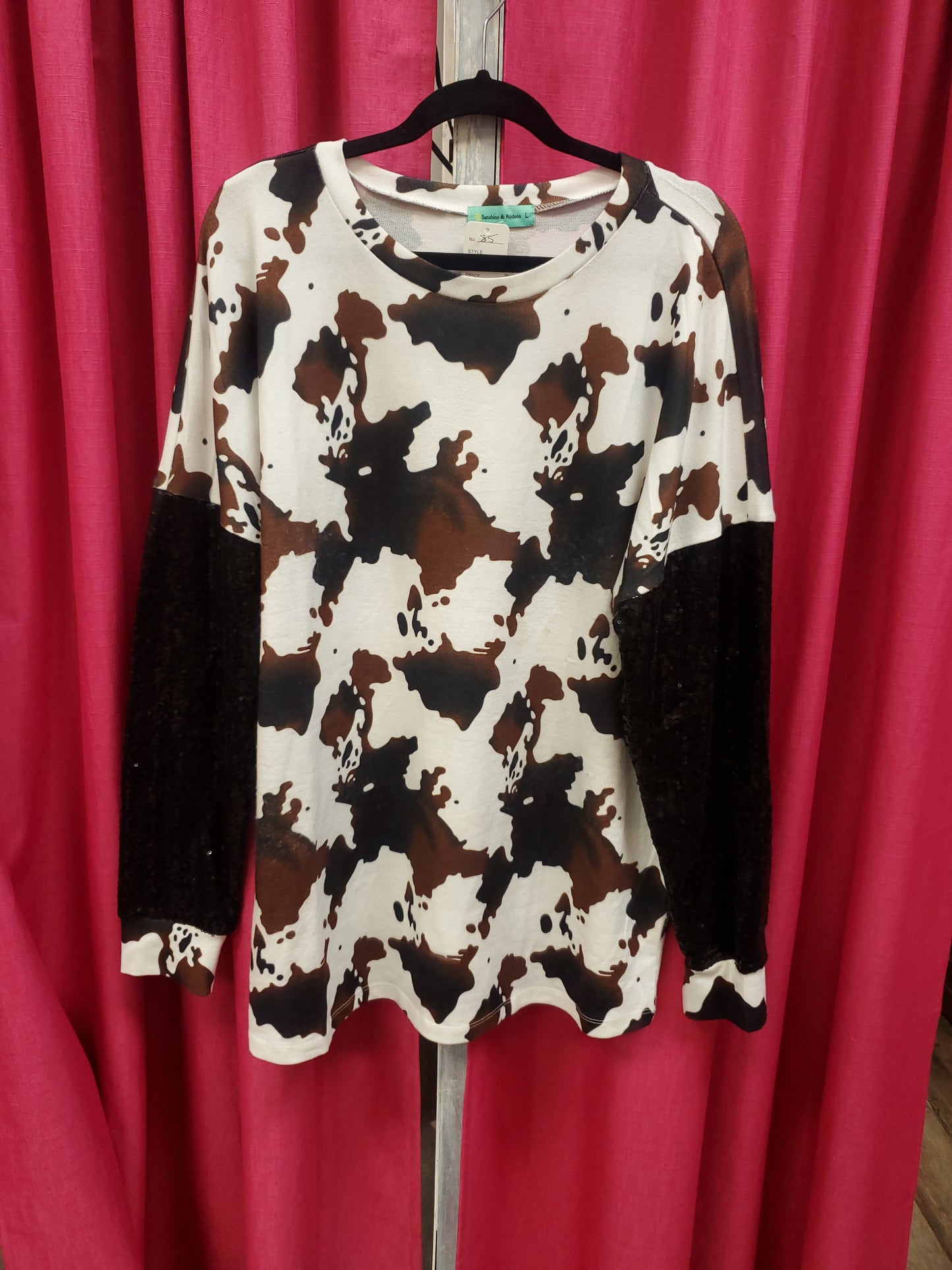 Sunshine & Rodeos. Brown Cow Print Sweater. Size L. RS 85 - Scarlett's Riverside Boutique
