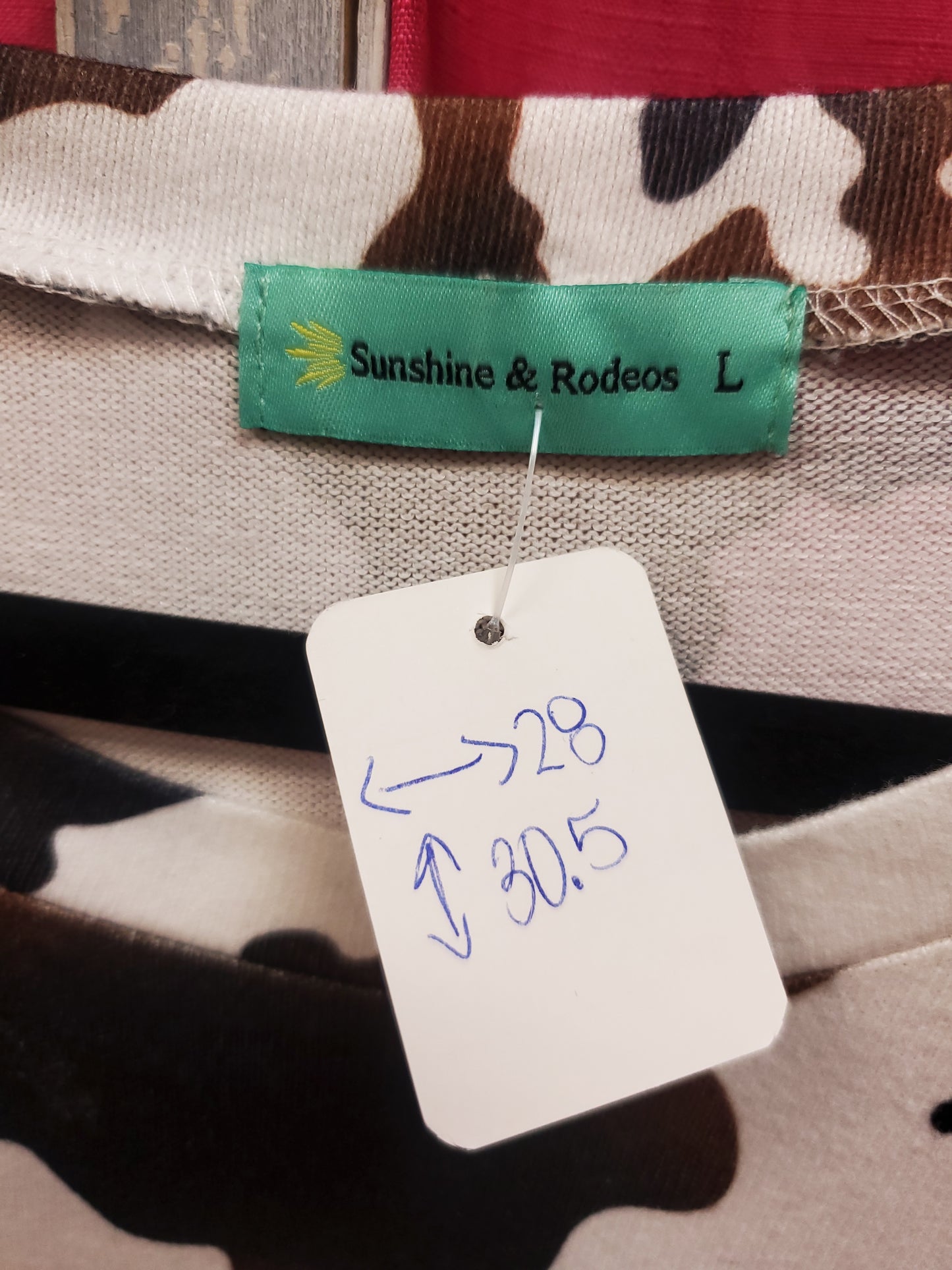 Sunshine & Rodeos. Brown Cow Print Sweater. Size L. RS 85 - Scarlett's Riverside Boutique
