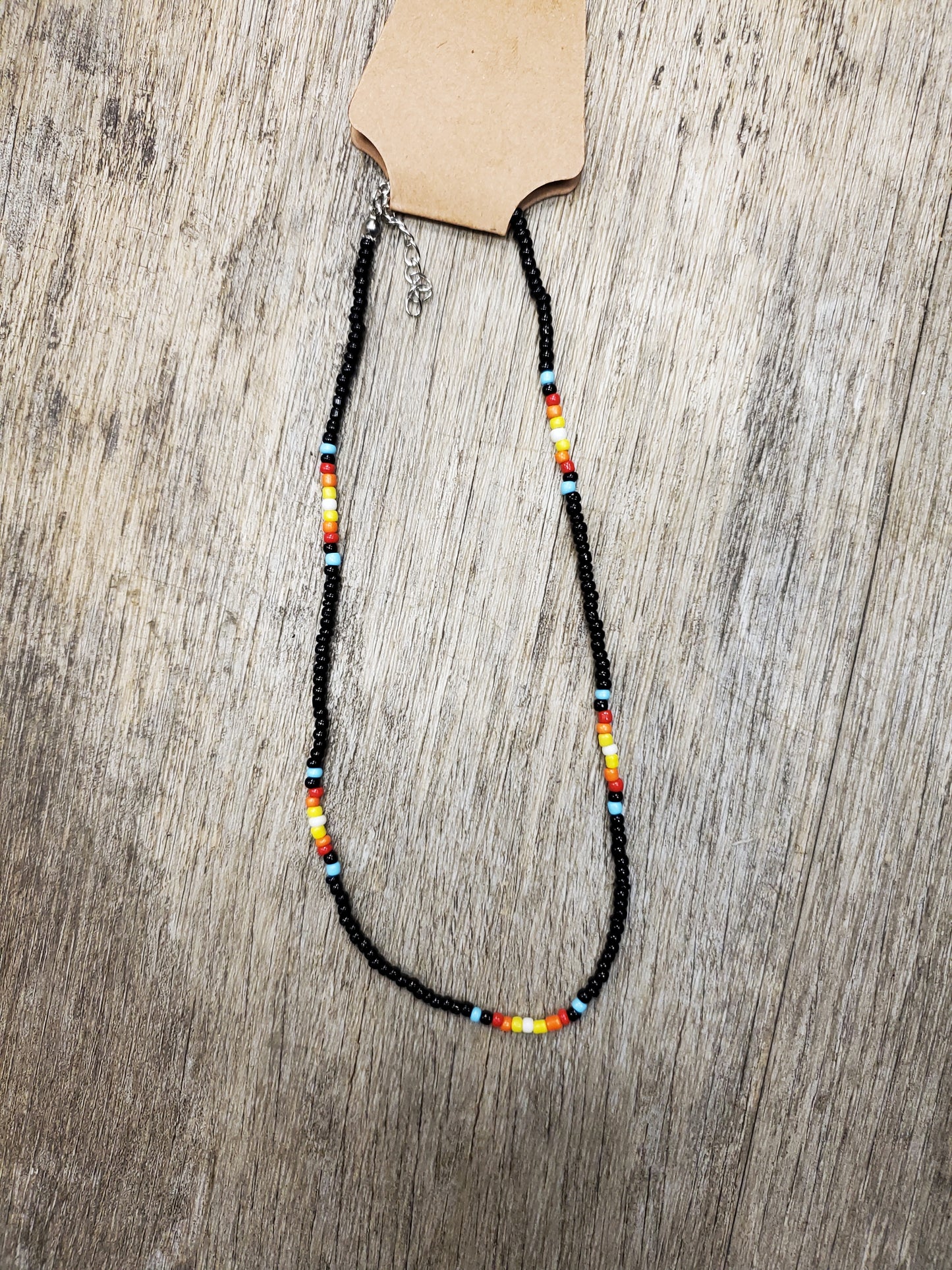 Black Beaded Necklace w/multi color sections.
