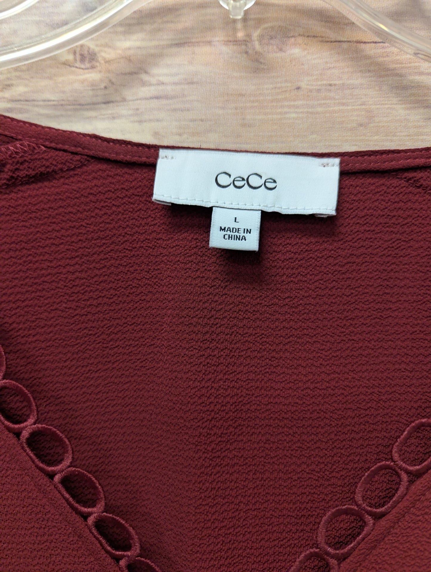 Cece wine long sleeve top. Size M. RS 97