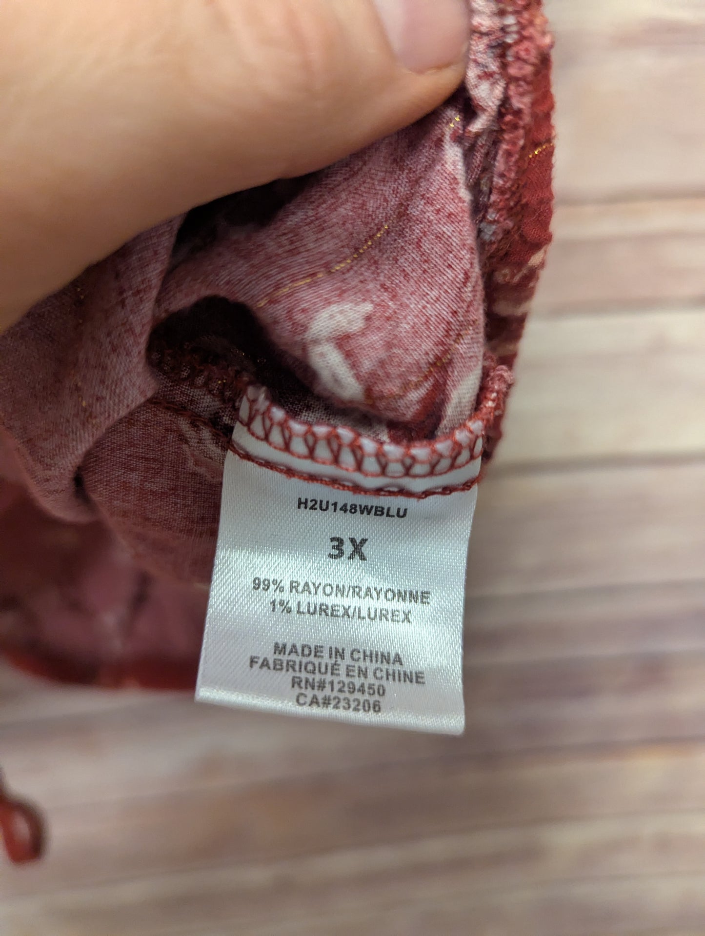 Burnt orange, short sleeve floral blouse. Size 3xl