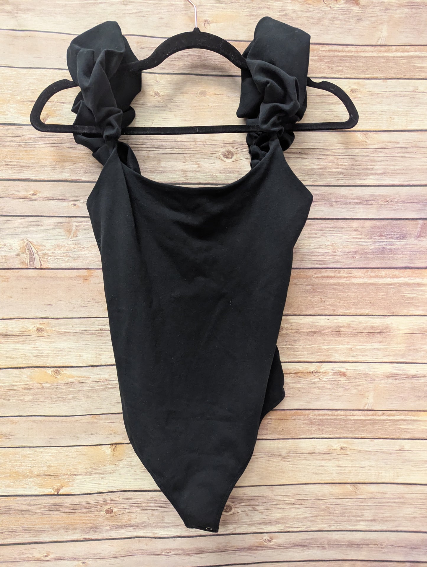 Free people black bodysuit. Size L. #97