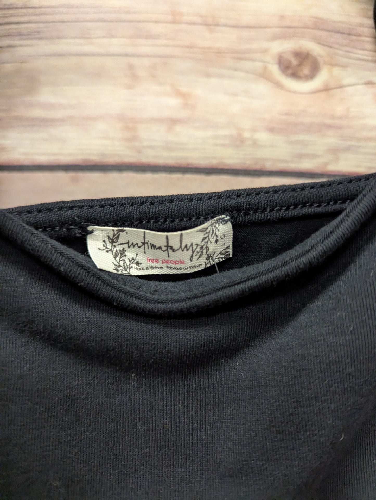 Free people black bodysuit. Size L. #97