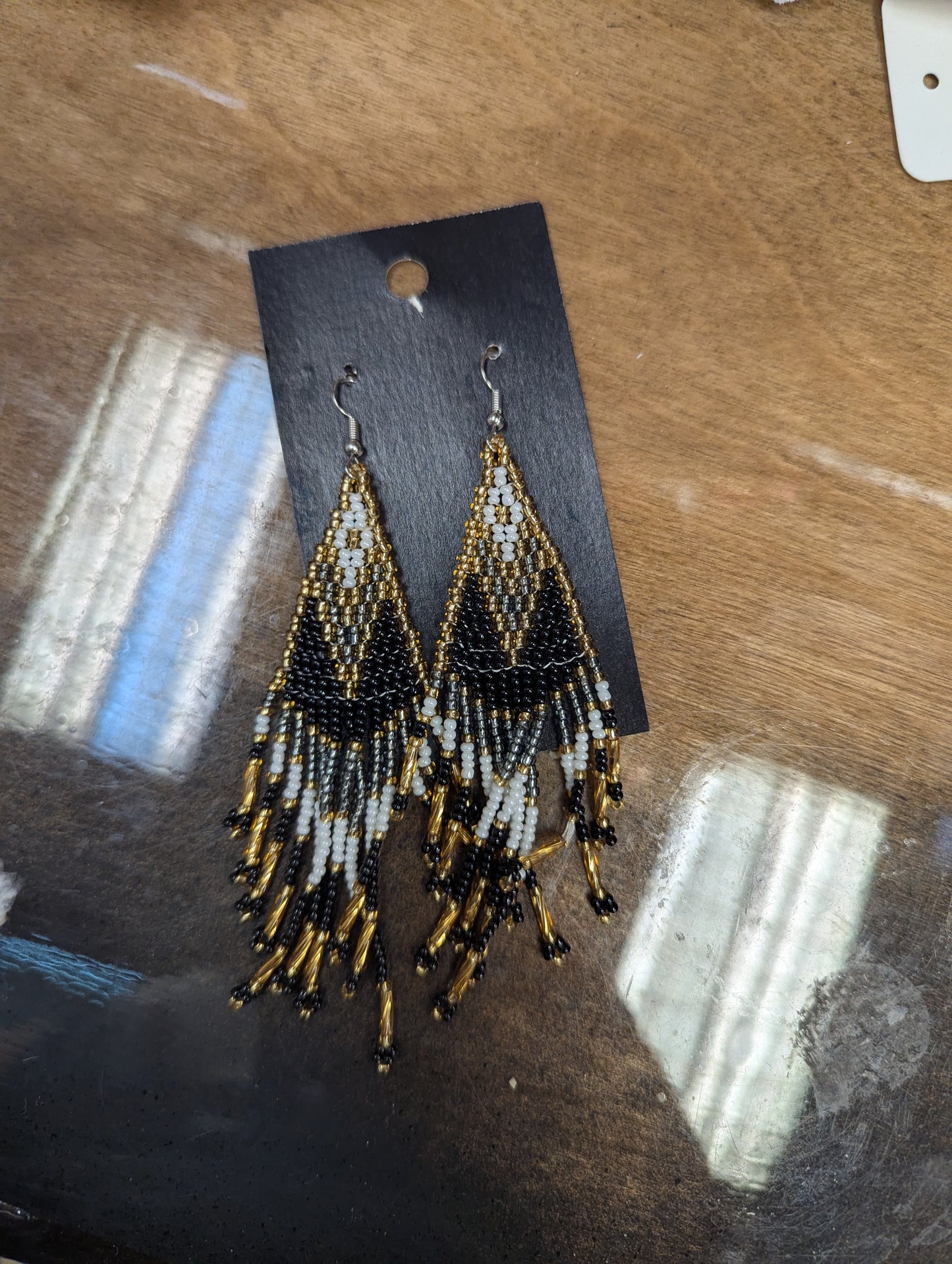 Black and Gold Aztec beaded earrings.