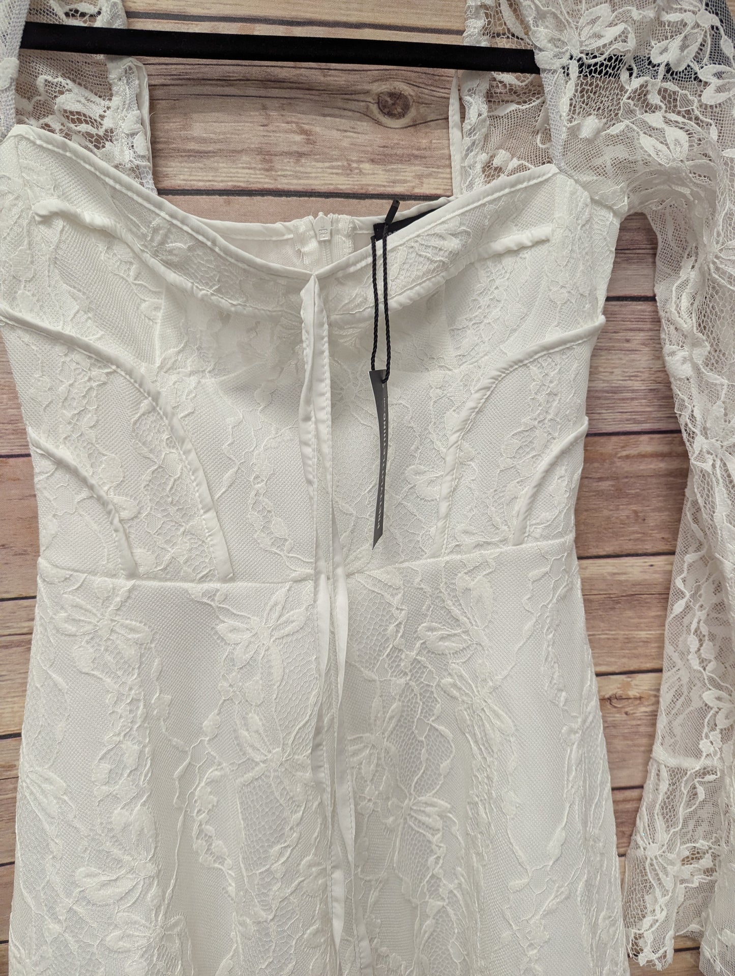 NWTs, Pretty little things white romper. Sz 2.