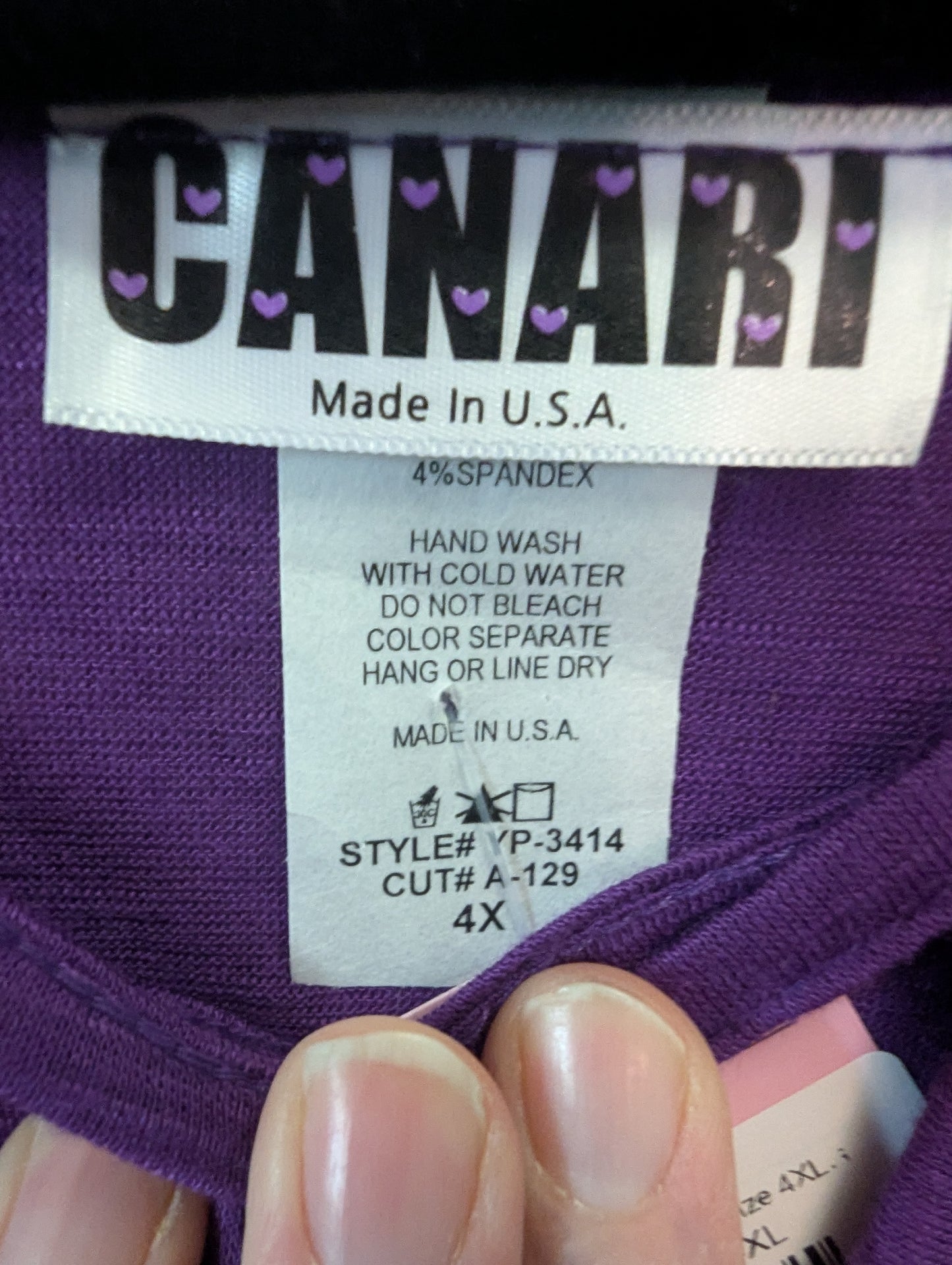 NWTs, 4xl Canari Women's Purple Top.