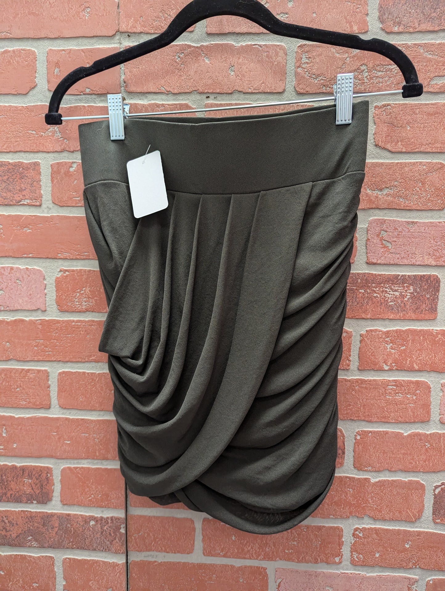 Green express skirt, size S. RS 1.