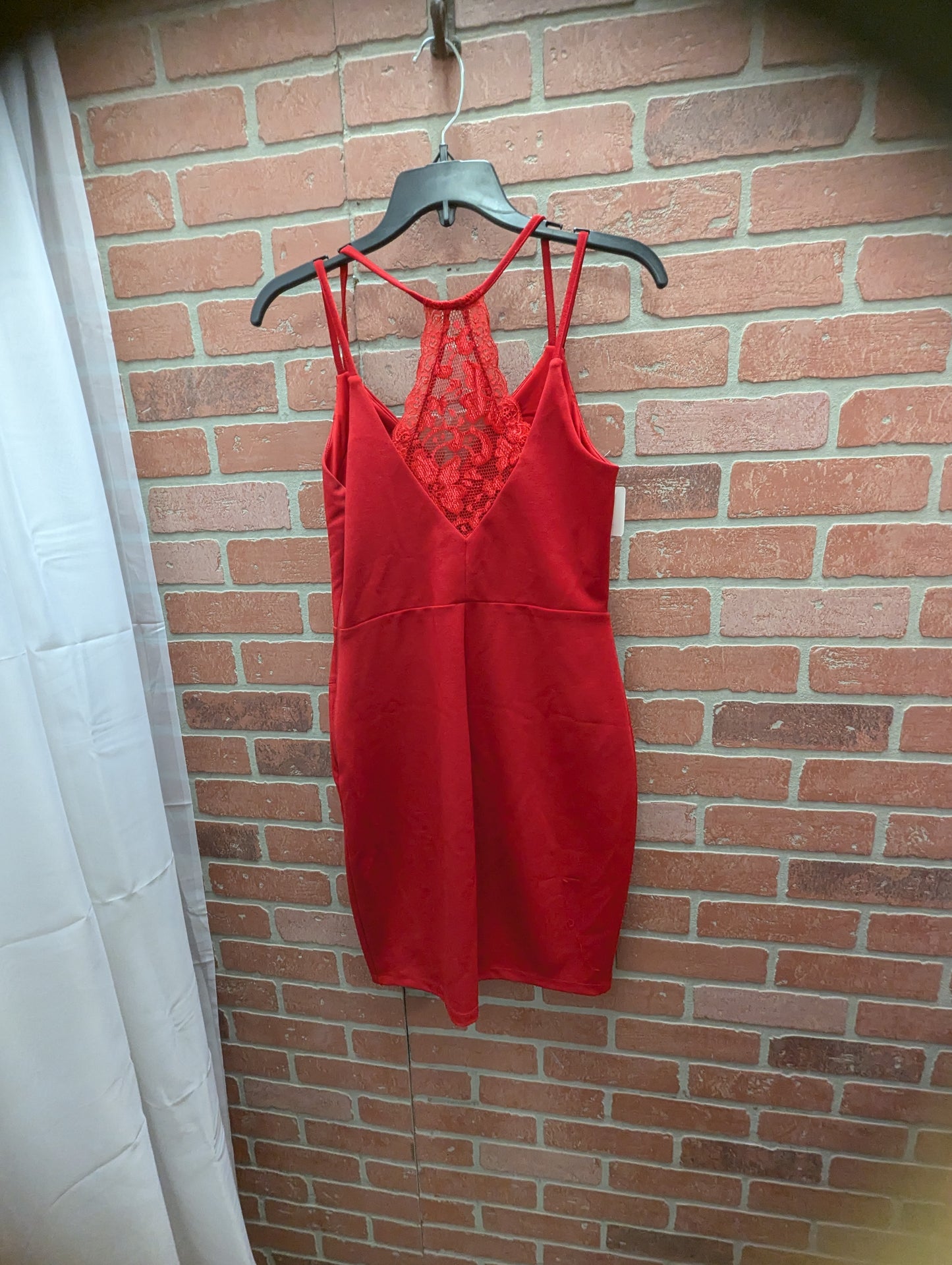 Red formal lace back dress.size 7. RS 5