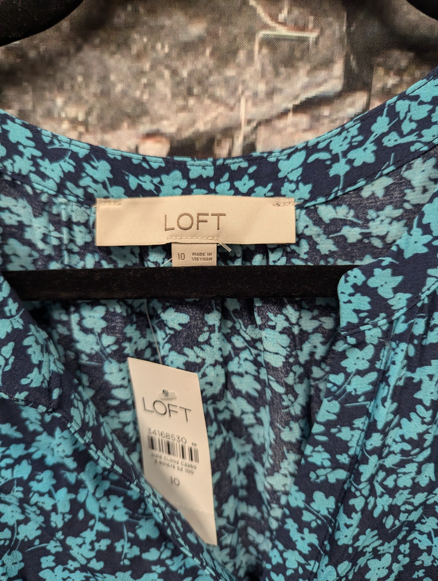 Loft blue floral midi dress. Size 10. RS 29