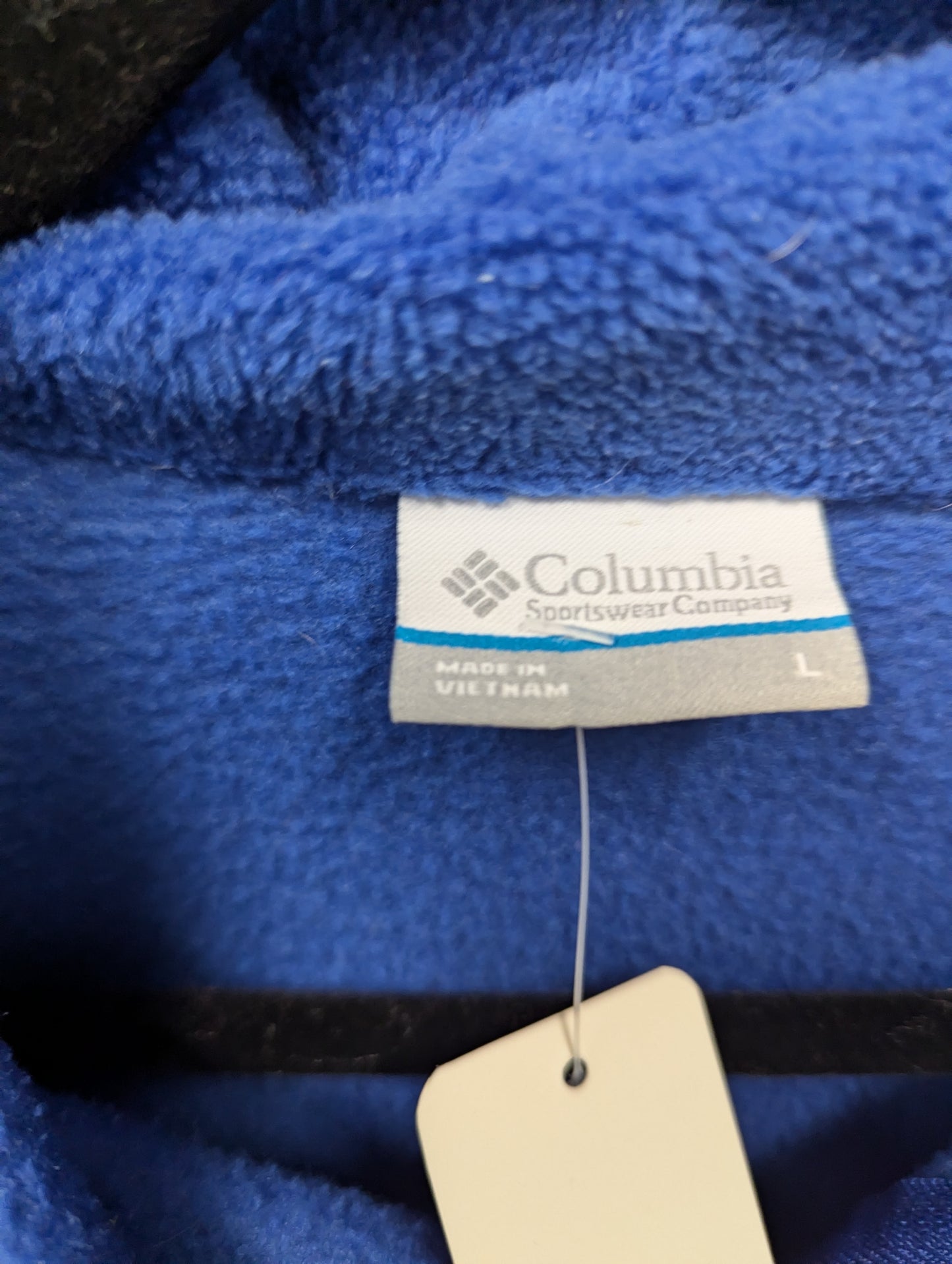 Blue fleece Columbia zip up jacket. Size L. RS 58