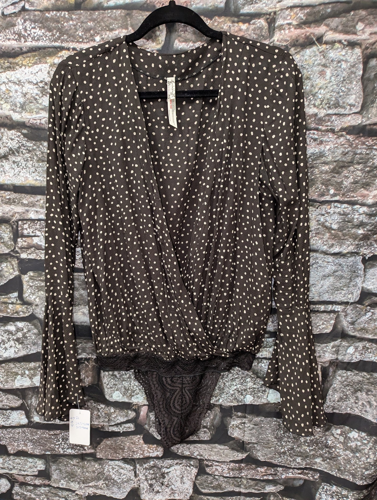 Free people black bodysuit size M.