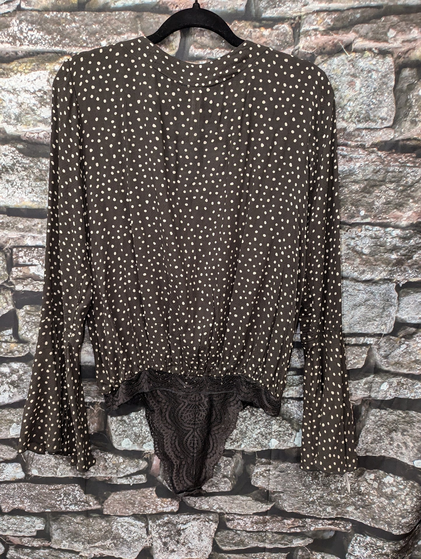 Free people black bodysuit size M.