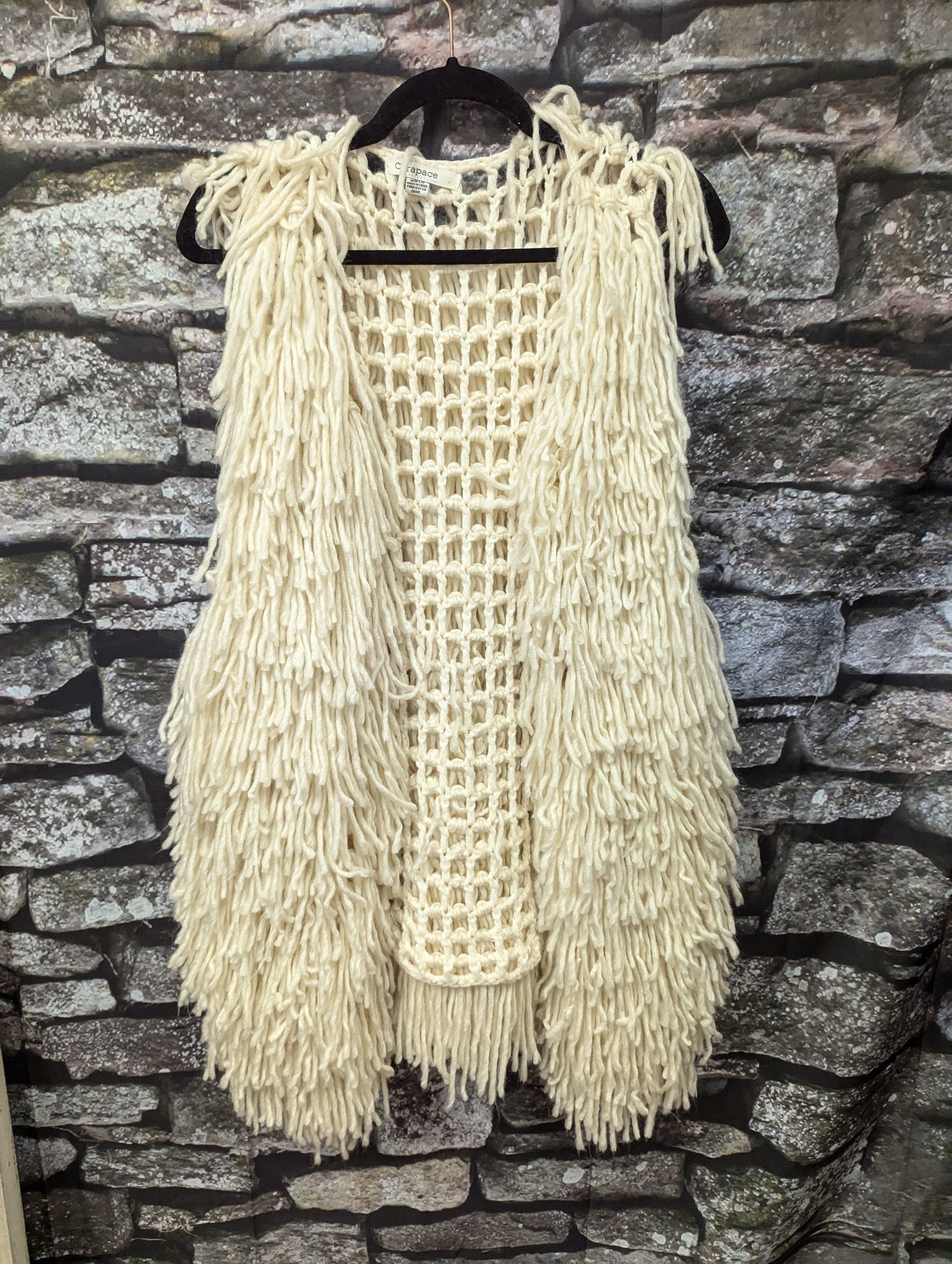 Knitted fringe vest