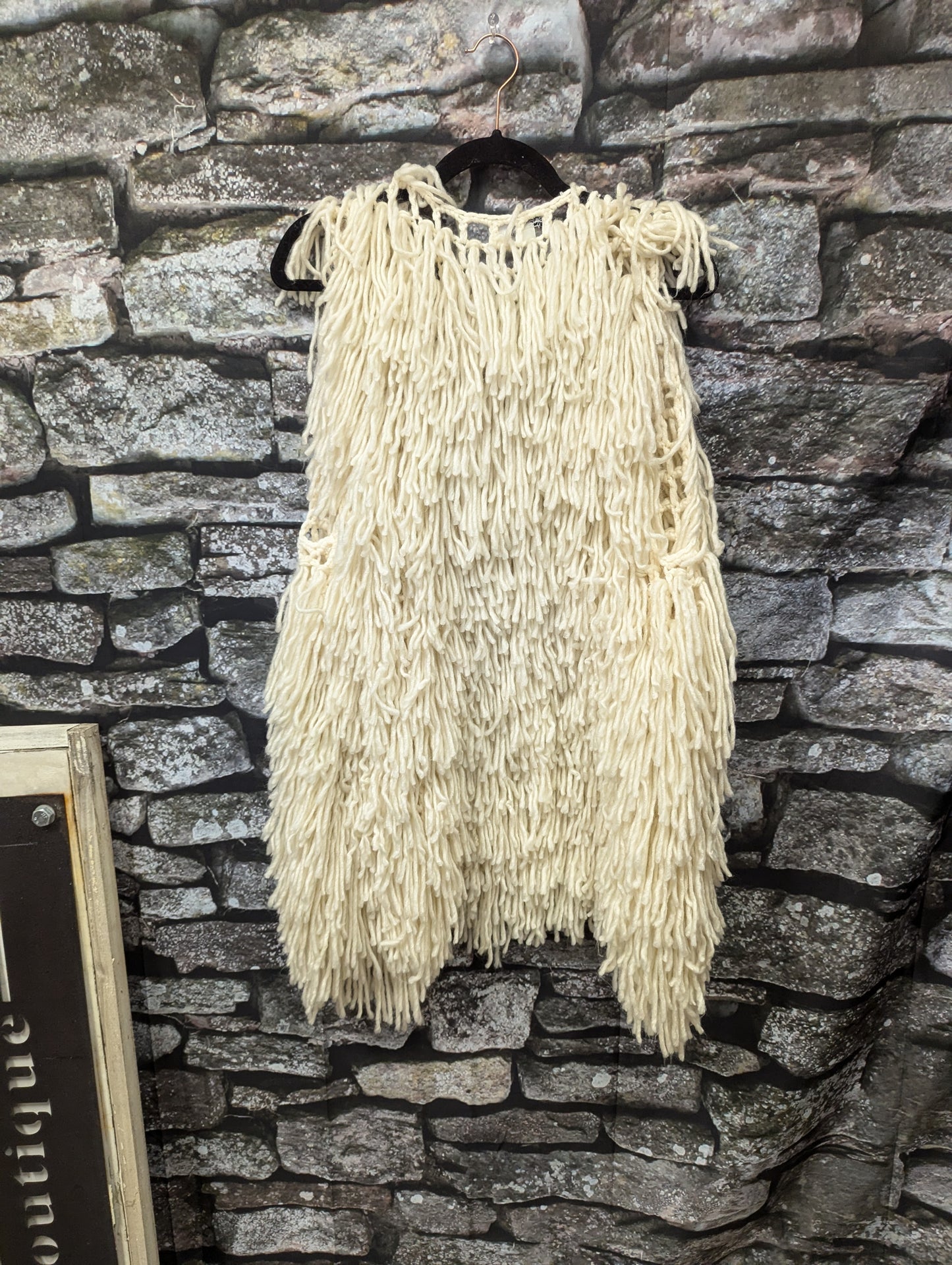 Knitted fringe vest