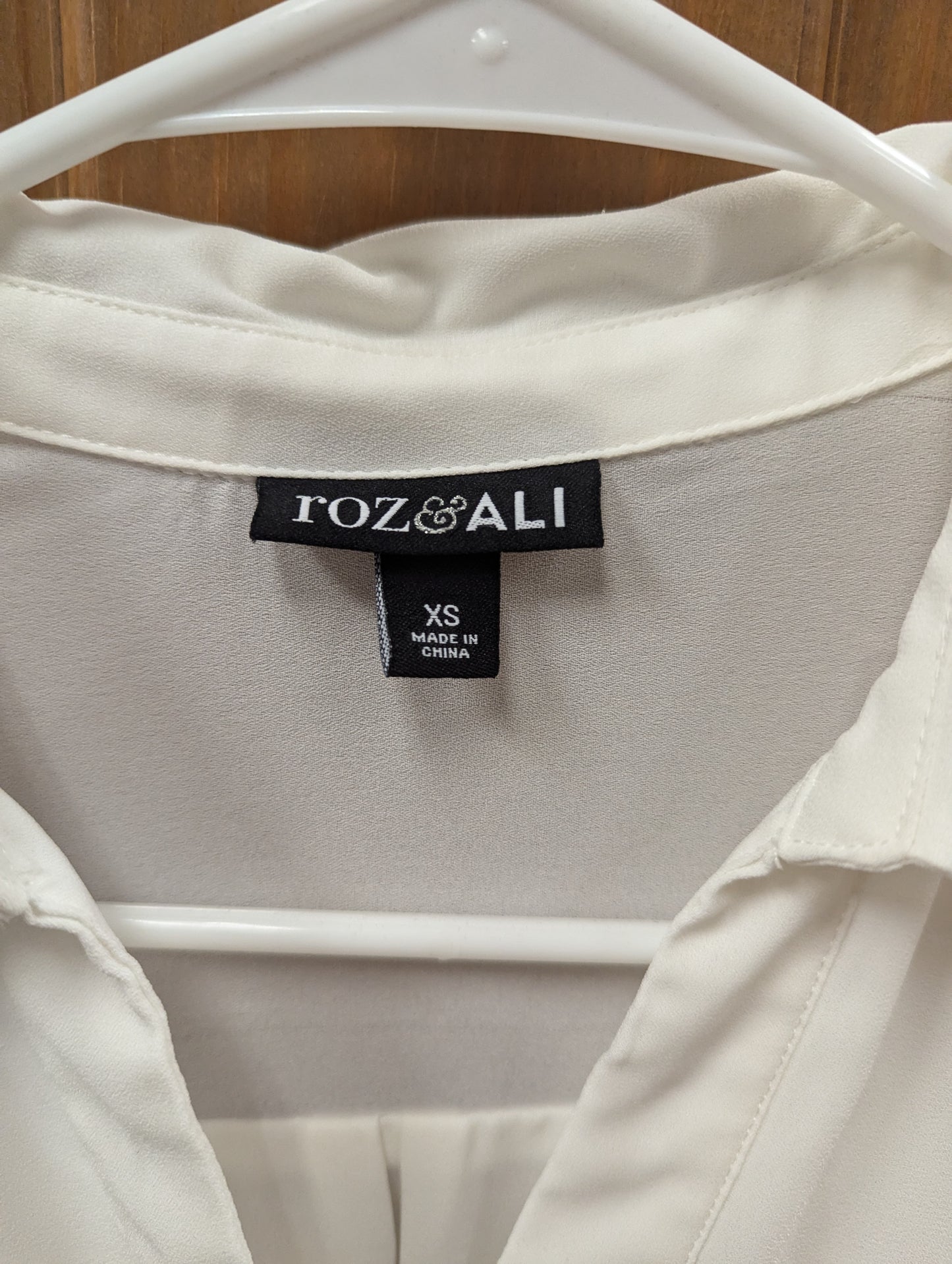 Roz and Ali white bell sleeve blouse. Size XS. RS 50