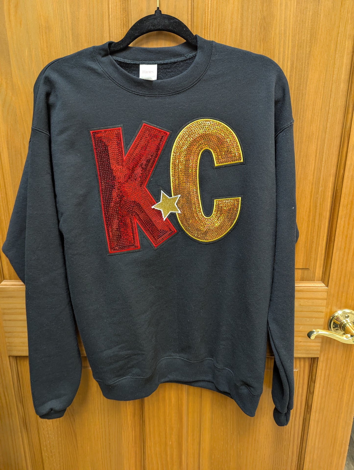 KC black sequin sweatshirt