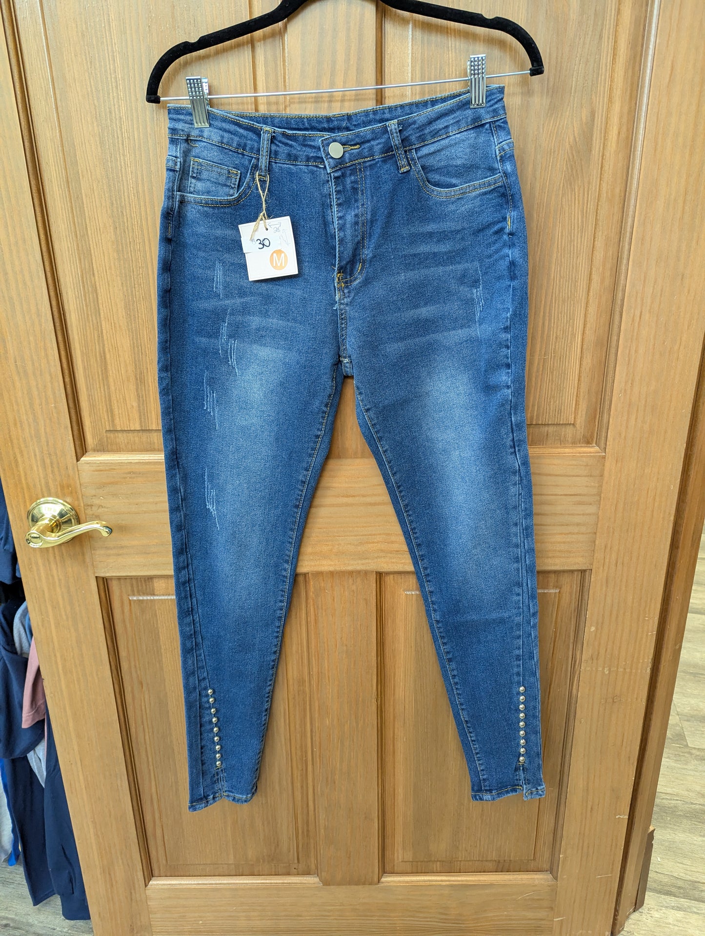 Straight leg, studded accent denim jeans. Size 28" inseam 29"