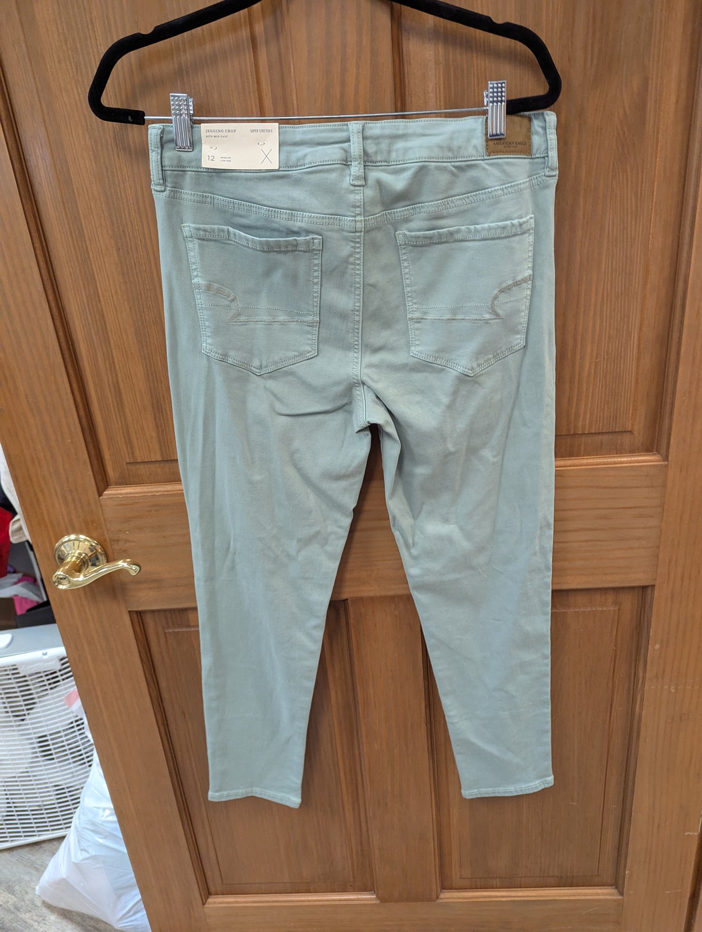 Light green American Eagle jeans. Size 12.